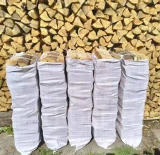 Дрова колотые в мешках сетках берёза, ольха, дуб